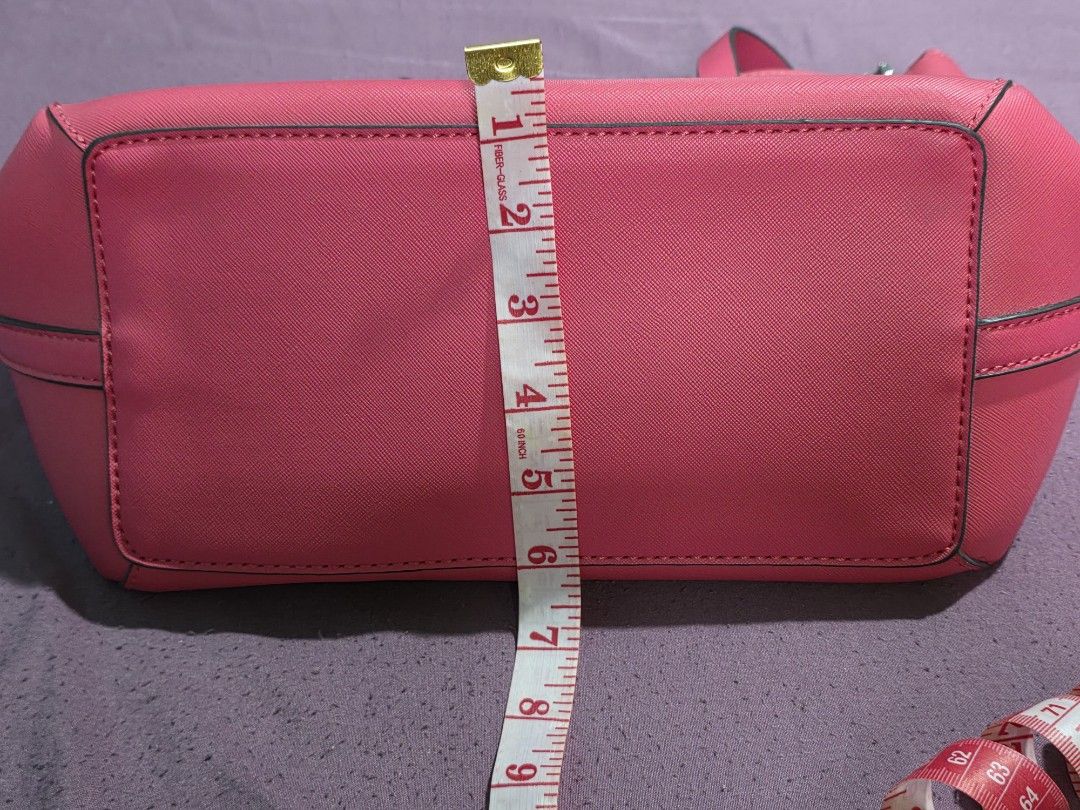 Guess Pink Tote Bag (Category: Tote Bags) located in Quezon City. Submitted by gabbie17 (Listing ID 1459994236, Image 3). Description: Turn heads with this vibrant, eye-catching hot pink GUESS tote! Perfectly structured with a textured saffiano finish, sturdy double top handles, and sleek silver-tone hardware featuring signature GUESS front pocket zipper pulls. ​Condition: Brand New ​Origin: Direct from US ​Price: ₱1,500 ​Color: Hot Pink / Fuchsi