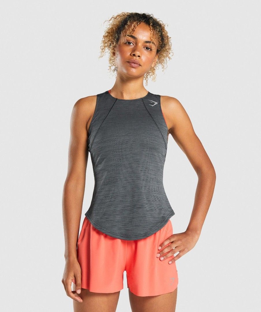 Gymshark Training Tank Top - Dark Grey (Category: Activewear) located in Pasay City. Submitted by tananoy0508061 (Listing ID 1460103734, Image 3). Description: - Gymshark training tank top - Dark grey marl color - Racerback design for full mobility - Lightweight and breathable fabric - Ideal for workouts and everyday wear - Please check photos for condition details.