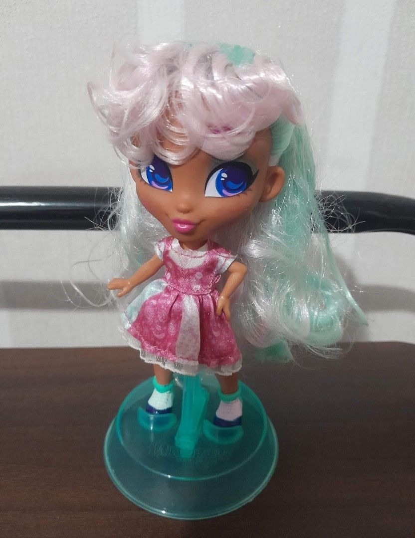 Hairdorables Doll (Category: Kids Toys) located in Quezon City. Submitted by warmturtle.ba931b (Listing ID 1460056182, Image 3). Description: Hairdorables Doll 💕 Authentic Hairdorables doll ✨ Hairdorables Hair Art Series 👧 Features gorgeous pastel pink, white & mint-green hair 💙 Beautiful big blue eyes and cute pink outfit 🧍‍♀️ Comes with the original doll stand shown in the photos 🌸 Lightly used and well taken care of 🧼 Clean and well main
