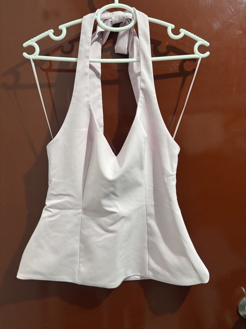 Halter top with Back Bow (Category: Shirts) located in Manila. Submitted by ejjjjjjjt (Listing ID 1460030800, Image 2). Description: Used this in my Vietnam trip, super classy and elegant looking! .