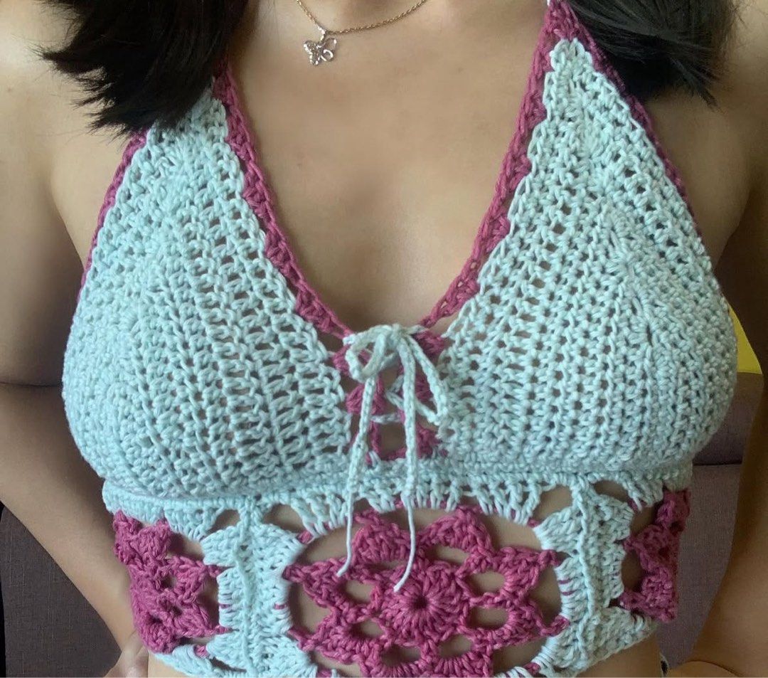 Handmade Crochet Halter Neck Crop Top (Category: Sleeveless) located in Manila. Submitted by silver.truemountain (Listing ID 1460068090, Image 2). Description: - Super cute handmade crochet halter top - Light blue with pink floral details - Lace-up front for adjustable fit - Perfect for festivals or a beach day - Unique, one-of-a-kind piece - Ideal for summer vibes.