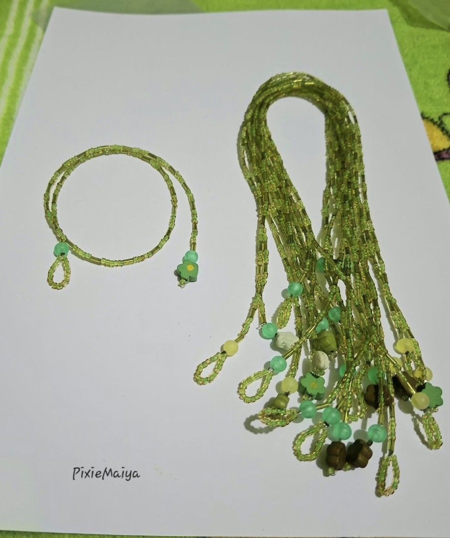 Handmade Green Beaded chocker or Anklet (Category: Anklets) located in Valenzuela. Submitted by pixieworks64309 (Listing ID 1460028862, Image 2). Description: - Handmade anklet and body chain set - Features green beads with small flower and stone accents - Adds a touch of flair to any outfit - Lightweight and comfortable for all-day wear - Ideal for summer vibes and festivals - Unique accessory -sold per piece.