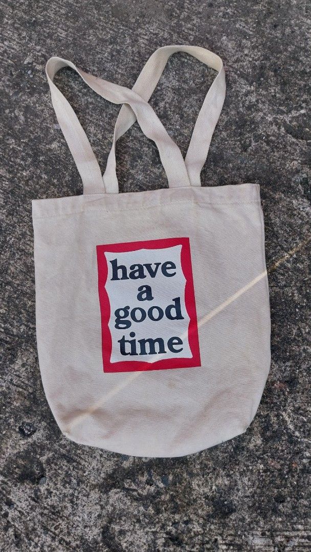 Have A Good Time Tote Bag (Category: Tote Bags) located in Manila. Submitted by razchid (Listing ID 1460004854, Image 1). Description: Canvas tote bag with 'Have A Good Time' graphic. Natural color with red and black print. Simple and functional for everyday use. Great for groceries or carrying essentials..