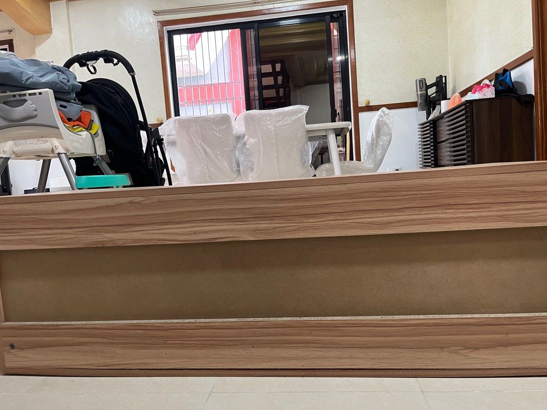 Heavy duty TV console (Category: TV Consoles) located in Taytay. Submitted by bibidibabidiboo_1213 (Listing ID 1459983915, Image 3). Description: Heavy-duty Media/TV console with two shelves and two drawers - Dimensions: 40cm (H) x 120cm (W) x 40cm (D) - Light oak color with black drawers - Has 2 shelves - Has 2 drawers - Didn’t accumulate molds during the rainy season so wood was treated - Really heavy, might need two people to carry it - RFS: O