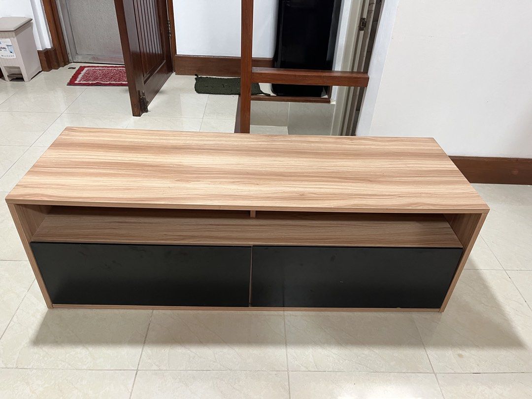 Heavy duty TV console (Category: TV Consoles) located in Taytay. Submitted by bibidibabidiboo_1213 (Listing ID 1459983915, Image 2). Description: Heavy-duty Media/TV console with two shelves and two drawers - Dimensions: 40cm (H) x 120cm (W) x 40cm (D) - Light oak color with black drawers - Has 2 shelves - Has 2 drawers - Didn’t accumulate molds during the rainy season so wood was treated - Really heavy, might need two people to carry it - RFS: O