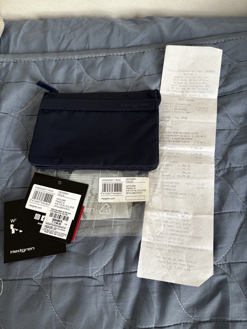 Hedgren Pouch (Category: Purses & Pouches) located in Manila. Submitted by declutter_byjaq (Listing ID 1459987601, Image 1). Description: Hedgren Follis Franc Medium Bought at Hedgren SM Mall of Asia In good condition RFS: Needs Cash.
