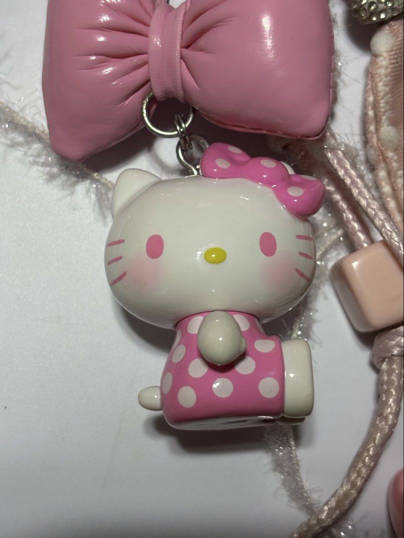 Hello Kitty Bag Charm (Category: Character Goods) located in Manila. Submitted by pmpmprn (Listing ID 1460036678, Image 3). Description: Authentic Hello Kitty (special; blind item); charms included are diy/handmade.