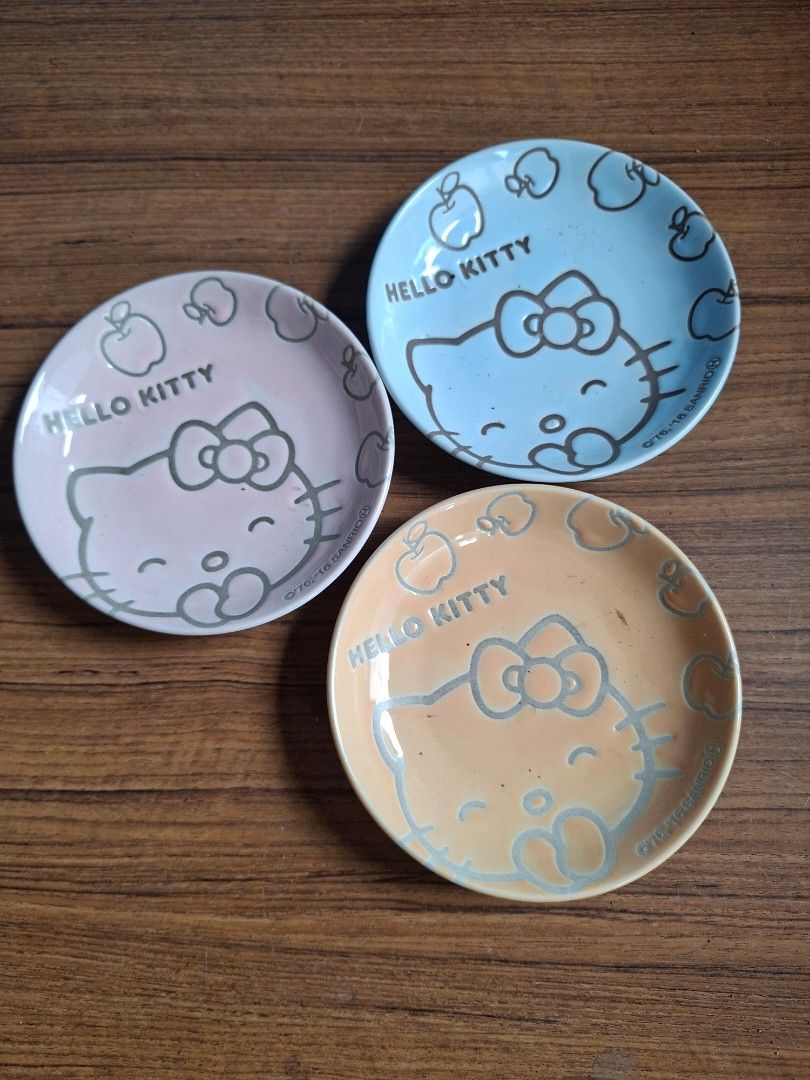 Hello Kitty Ceramic Mini Plates (Category: Other Kitchen Appliances) located in Consolacion. Submitted by luxekerei (Listing ID 1460029895, Image 1). Description: - Hello Kitty ceramic mini plates released by Sanrio with a 2011 copyright date..