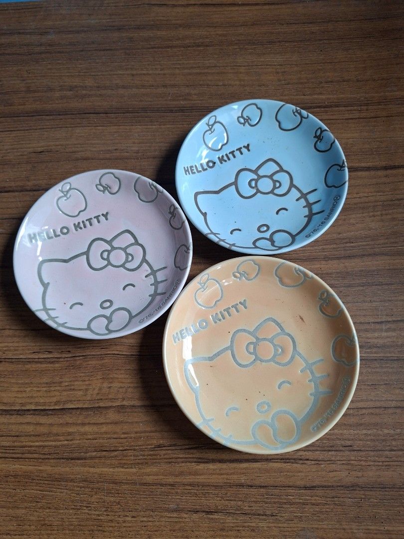 Hello Kitty Ceramic Mini Plates (Category: Other Kitchen Appliances) located in Consolacion. Submitted by luxekerei (Listing ID 1460029895, Image 2). Description: - Hello Kitty ceramic mini plates released by Sanrio with a 2011 copyright date..