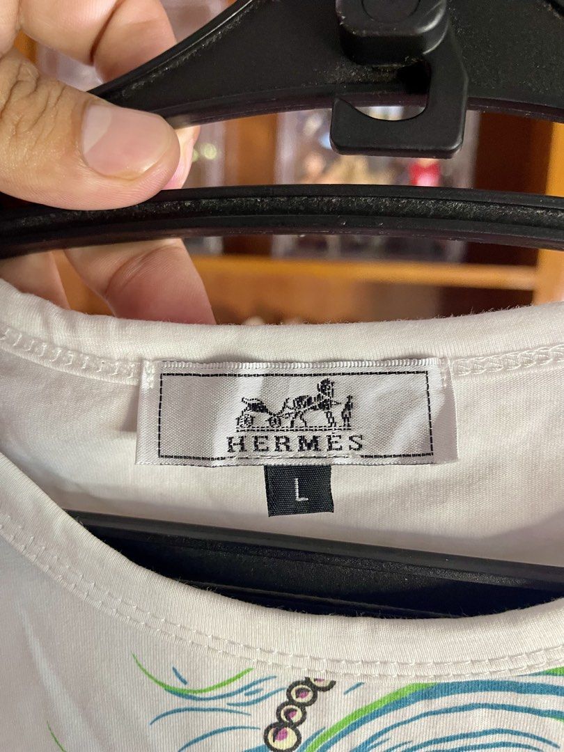 HERMES (Category: Shirts) located in Davao. Submitted by the_rare_hustla (Listing ID 1459940767, Image 3). Description: HERMES Issue Washable Stain Need Wash Only Color rate 10/10 Width - 18 Length - 26 Size L on tag Fit To Small to Med (Womens) Dm If Interested!.