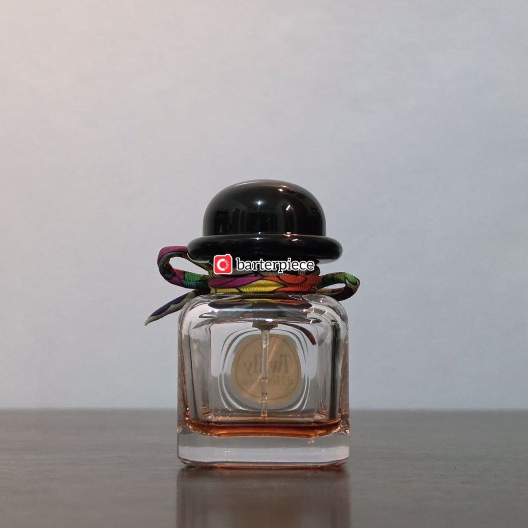 Hermes Twilly d'Hermès (Eau de Parfum) (Category: Fragrance & Deodorants) located in Quezon City. Submitted by barterpiece (Listing ID 1460096141, Image 2). Description: Twilly d'Hermès EDP — 50 mL • ~5 mL remaining / 50 mL (juice level is approximate and difficult to gauge at this level; please check the photos to see the juice level) • With box 📍 Diliman, Quezon City 💳 MOP: Maribank 🚚 MOD: Grab, Lalamove, LBC, J&T Notes: • 100% authentic. I 