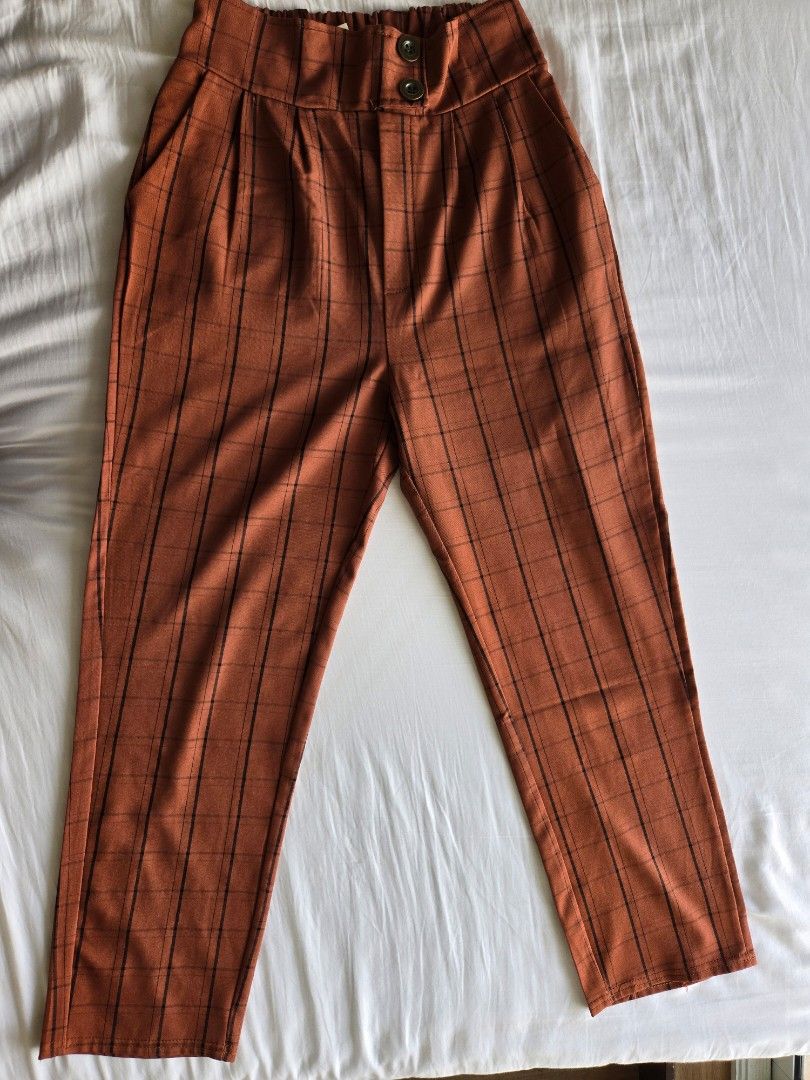 High Waisted Plaid Pants - Olive Green & Rust Orange 300each (Category: Other Bottoms) located in Manila. Submitted by glitter8 (Listing ID 1459969211, Image 3). Description: - Trendy plaid pattern - High-waisted design - Comfortable gathered elastic waistband at the back - Stylish two-button front detail - Flattering cropped length - Available in versatile olive green and rust orange - Perfect for casual or dressed-up looks - fits xs-s - with di