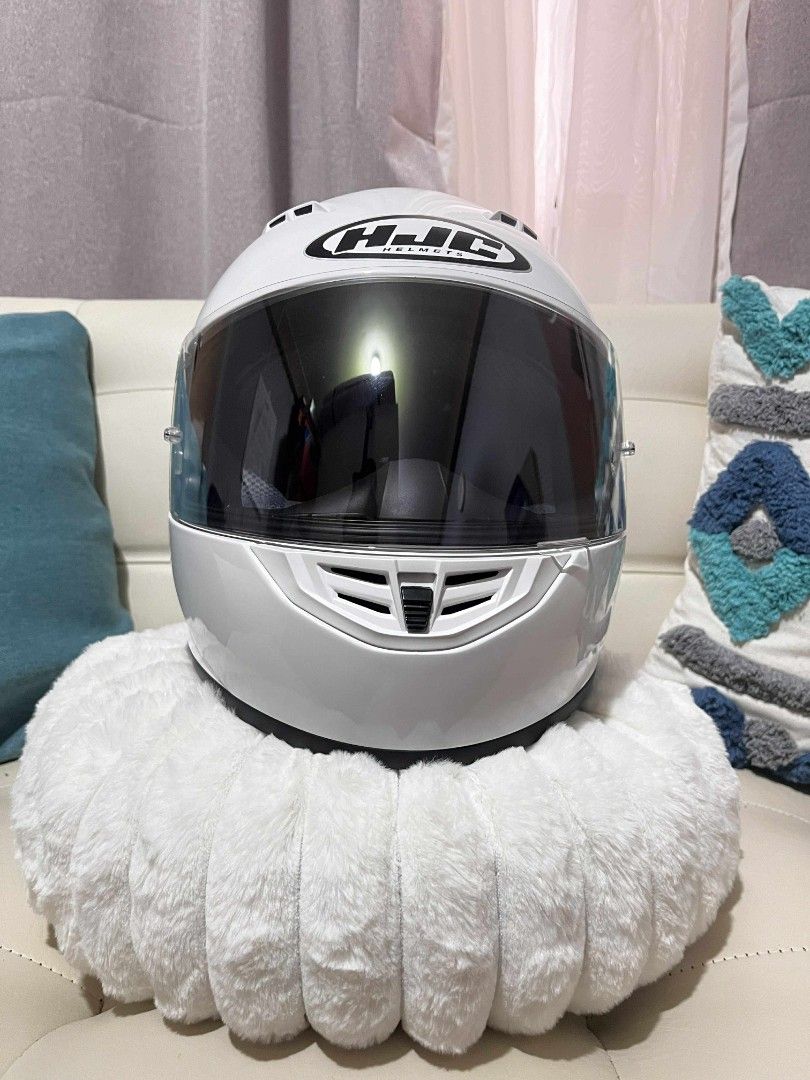 HJC Helmets Full Face Motorcycle Helmet (Category: Helmets and other Riding Gears) located in Manila. Submitted by libya.ann (Listing ID 1459998324, Image 3). Description: - White HJC full face helmet - Clear visor included - Ideal for motorcycle riding - Ready for a new owner - Please check photos for detailed condition.