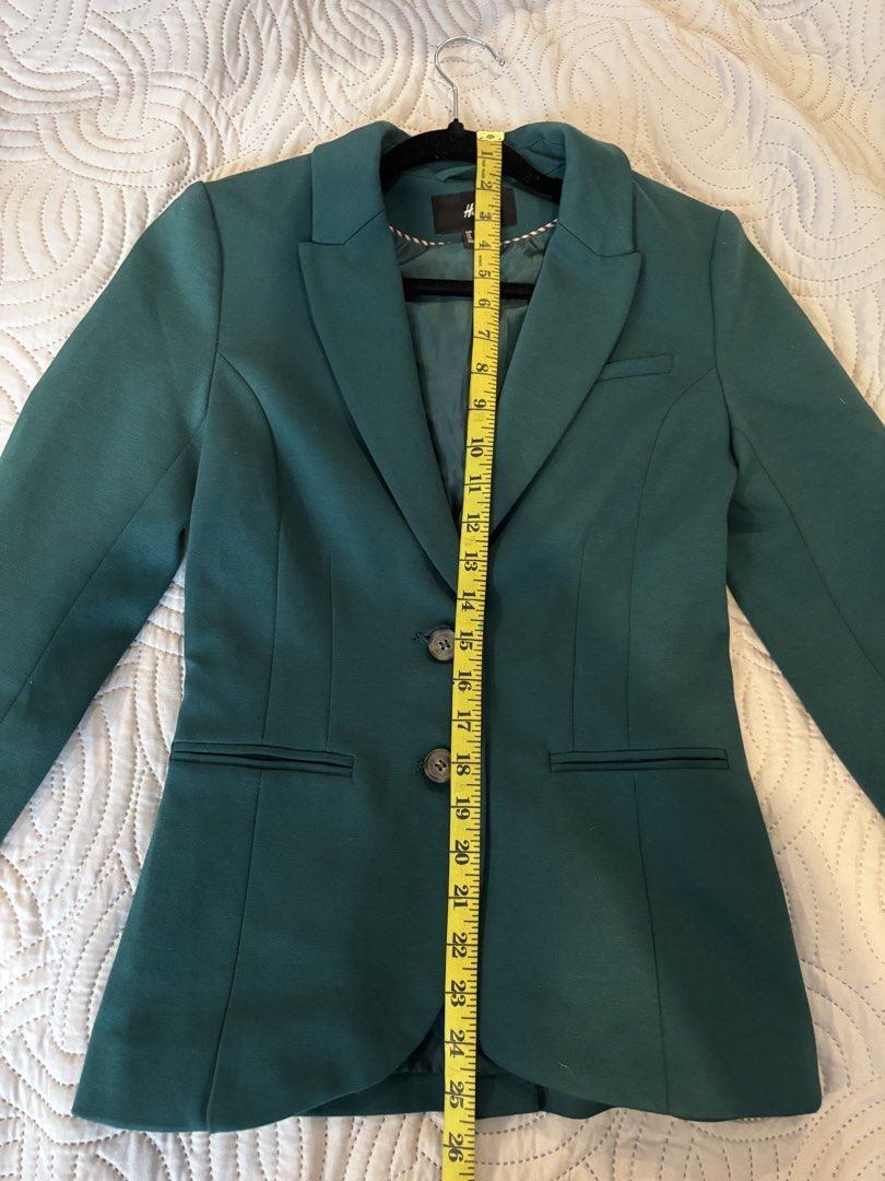 H&M Green Blazer Jacket (Category: Coats, Jackets and Outerwear) located in Cabuyao City. Submitted by thriftedwonders18 (Listing ID 1460002270, Image 3). Description: - H&M Blazer - Deep Green Color - Two-button closure - Two front pockets - Measurements: Pit to pit - 16 inches, Length - 25 inches - Versatile: Great for work or a night out.