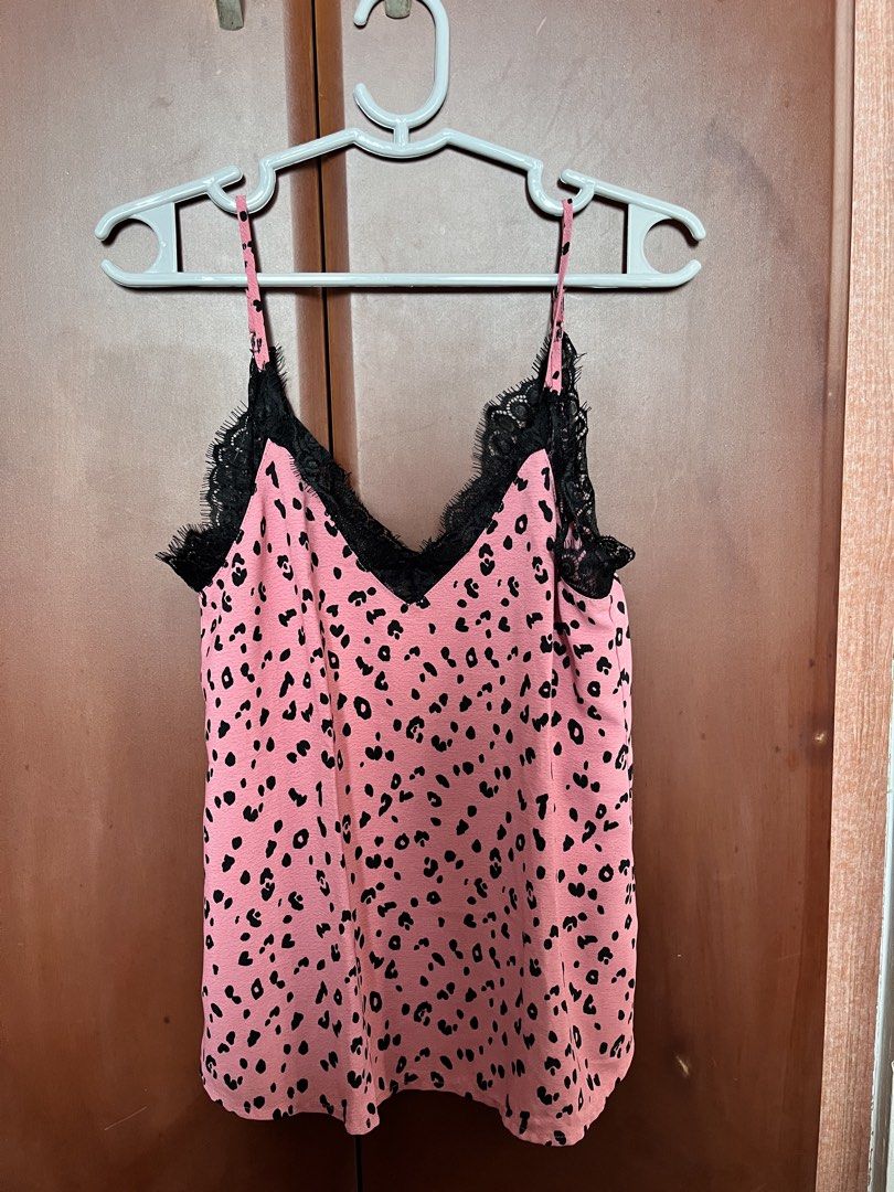 H&M Pink Leopard Print Lace Cami Top (Category: Sleeveless) located in Quezon City. Submitted by shoppingseconds (Listing ID 1459944737, Image 2). Description: - Cute pink leopard print cami top - very trendy now - Adjustable spaghetti straps Fits small - semi medium Worn once, can send you a pic .