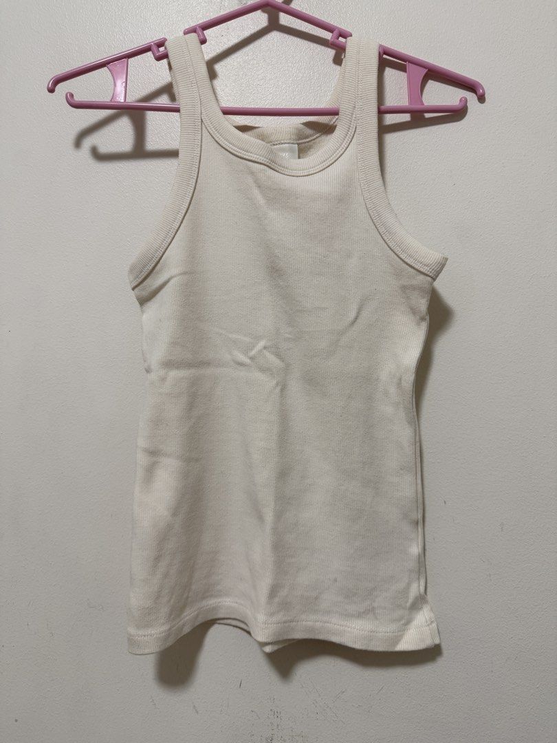 H&M ribbed tank top (Category: Sleeveless) located in Quezon City. Submitted by clothe.kr (Listing ID 1460037938, Image 1). Description: Has a few stains.