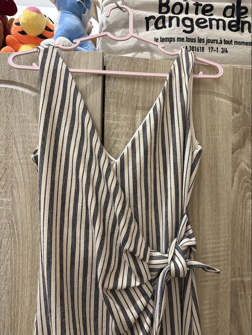 H&M Wrap Around Midi Dress (Category: Dresses) located in Makati City. Submitted by jo.thrifts (Listing ID 1460024062, Image 1). Description: h&m midi dress - striped wrap around style (this is super pretty 🥹) size small on tag no issues rfs: decluttering happy to keep this if hindi mabili hehe message me for any inquiries. details & actual photos are posted. happy shopping! ❤️ *feel free to browse my account for other cute finds!! 😉 🚚 shippin