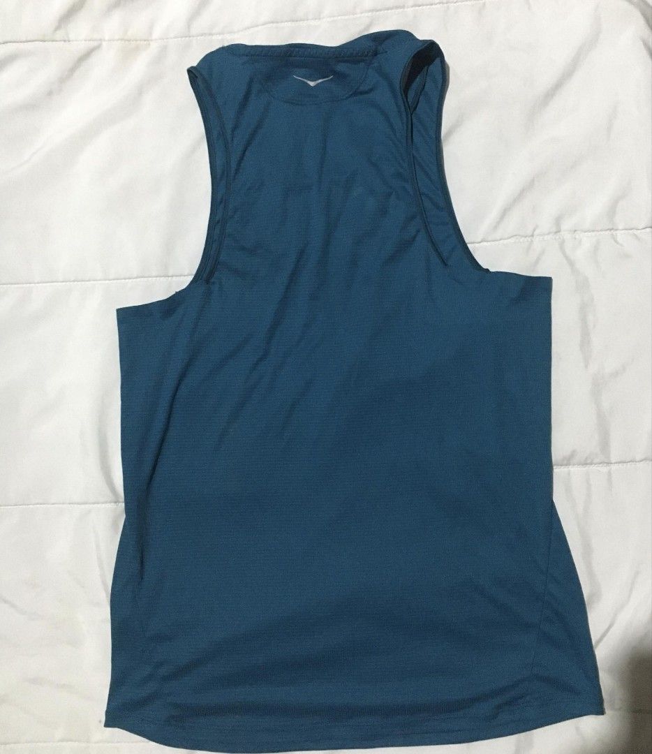 Hoka Glide Singlet (Category: Activewear) located in Quezon City. Submitted by thriftyzx (Listing ID 1460004136, Image 3). Description: Hoka Glide Singlet Size Medium Width: 16.5-17 Length: 26 Excellent Condition Meron small runs sa loob not visible sa labas see the last picture 799 Freeshipping Location: QC.