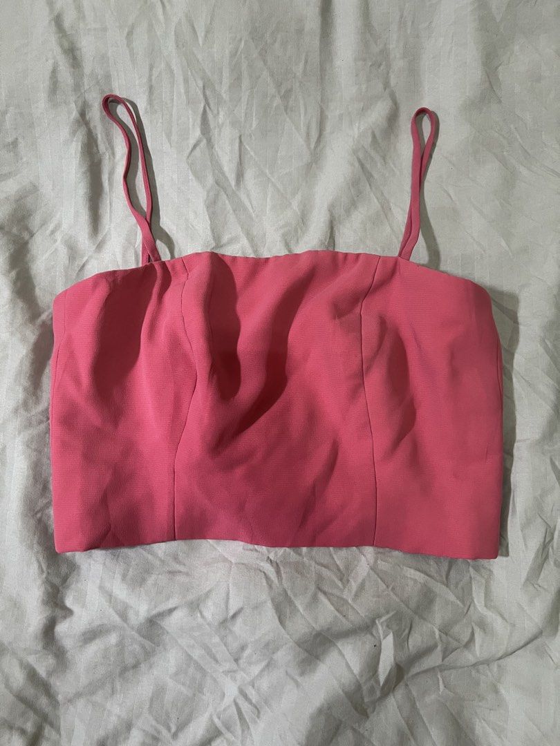 Hot Pink cropped top (XS-S) (Category: Sleeveless) located in Paranaque City. Submitted by michcianox (Listing ID 1460014419, Image 1). Description: Pink top with adjustable spaghetti strap Straight cut XS to S Price does not include shipping fee Can ship through lalamove Perfect for innerwear and layering 📍meet up location: SM Sucat 💵 payment through gcash/maya.