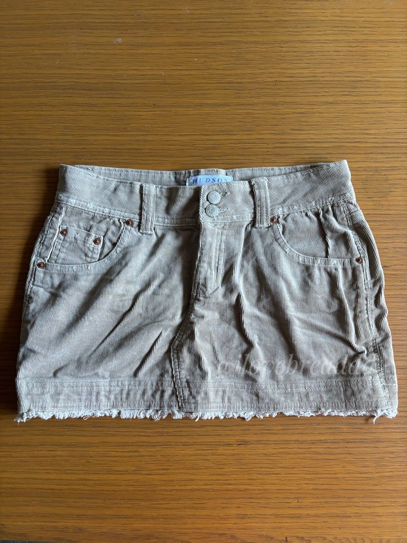 Hudson Corduroy Mini Skirt (Category: Skirts) located in Davao. Submitted by ilovebreaddd (Listing ID 1459965497, Image 1). Description: - Cute corduroy mini skirt - Brand: Hudson - Color: Light tan/beige - Features: Frayed hem detail - Estimated Size: 27-28 - Style: Great for casual wear.