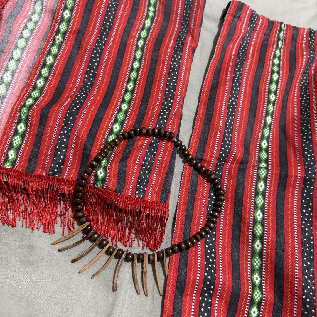 Igorot Costume 13-14Y (Category: Babies & Kids Fashion) located in Las Pinas. Submitted by mieshy (Listing ID 1459972150, Image 3). Description: Used once Vest, bahag and necklace Body vest 36in Vest length 19in Waist (bahag) 22-25in .