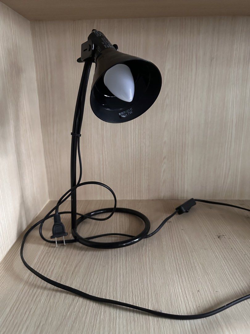 IKEA LAGRA Black Adjustable Desk Lamp with LED Bulb (Category: Lighting) located in Makati City. Submitted by rmgcloset (Listing ID 1460049924, Image 1). Description: - Adjustable black desk lamp - Includes LED bulb - Flexible neck for easy positioning - Ideal for studying or working - Plugs into standard wall outlet - In good working condition.