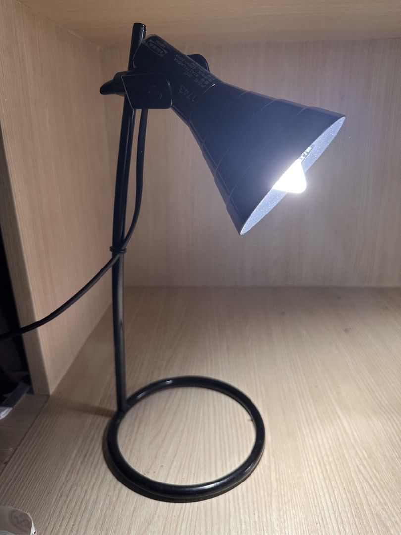 IKEA LAGRA Black Adjustable Desk Lamp with LED Bulb (Category: Lighting) located in Makati City. Submitted by rmgcloset (Listing ID 1460049924, Image 3). Description: - Adjustable black desk lamp - Includes LED bulb - Flexible neck for easy positioning - Ideal for studying or working - Plugs into standard wall outlet - In good working condition.
