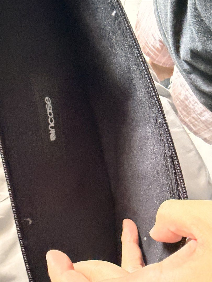 Incase Grey Laptop Sleeve (Category: Laptop Bags & Sleeves) located in Manila. Submitted by ellede32655 (Listing ID 1459971393, Image 3). Description: - Grey Incase laptop sleeve - Zipper closure - Soft interior lining for device protection - Fits most 13-inch laptops - Perfect for everyday use and travel - Keeps your laptop safe and scratch-free - Simple and functional design.