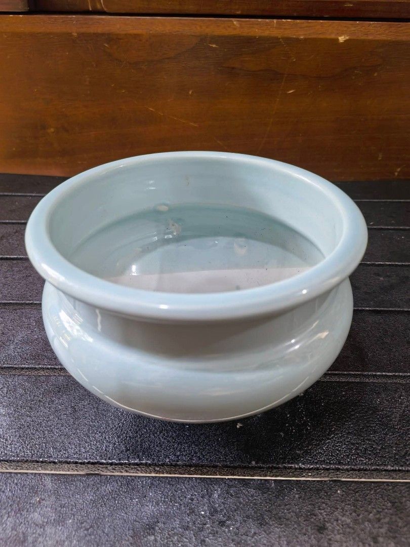 Incense Burner - Big size (Category: Vases & Decorative Bowls) located in Cebu City. Submitted by dudes_villanueva (Listing ID 1459940893, Image 1). Description: Incense Burner - Big size 📌 Light Blue Celadon-Glazed Ceramic tripod incense burner with a glossy finish and three small feet. 📌 In excellent condition. Diameter : 6 in Height : 4 in.