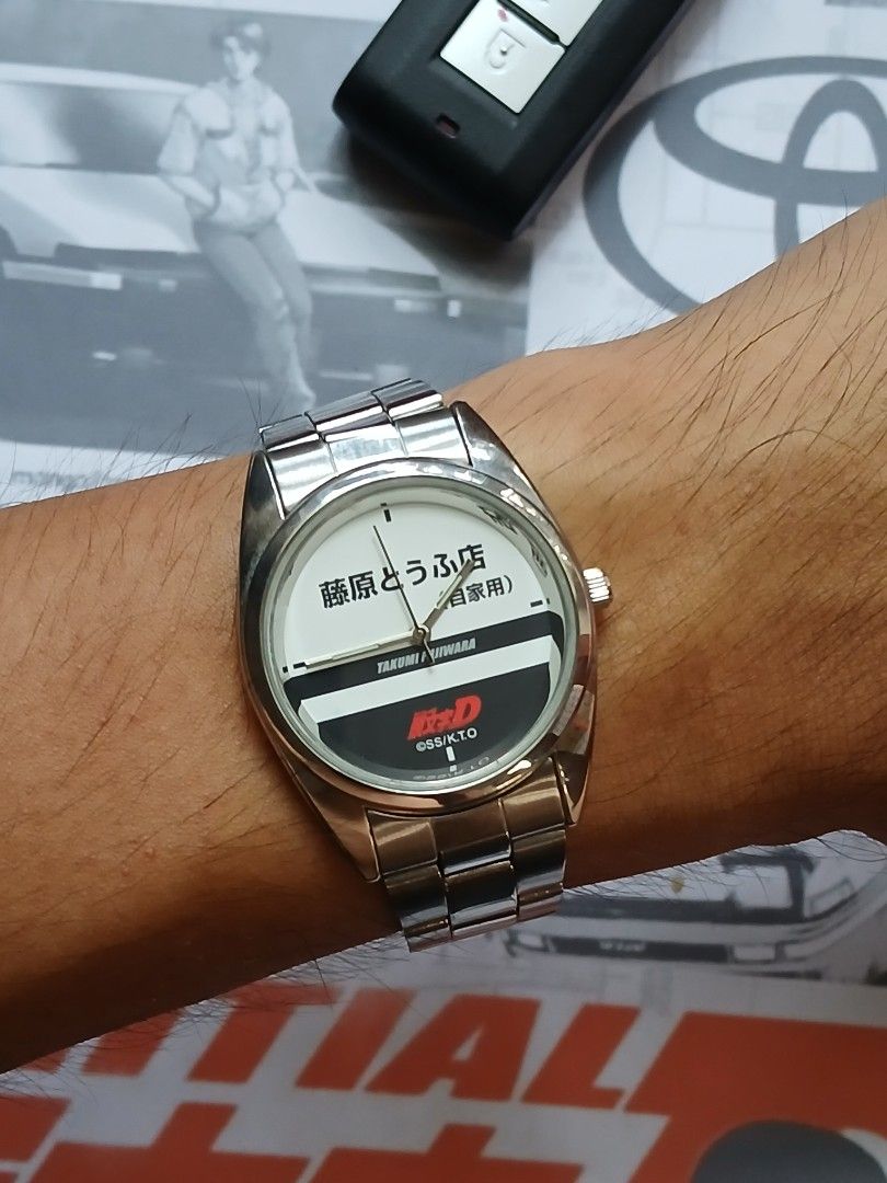 INITIAL D "FUJIWARA Tofu Shop", Quartz (Category: Luxury Watches) located in Tabaco. Submitted by igoys-watches (Listing ID 1459972746, Image 1). Description: INITIAL D "FUJIWARA Tofu Shop", Quartz (UNISEX) ✅️Good Running Condition ✅️Clean Dial ✅️All Original ✅️Crystal is in great condition ✅️Luminous Hands ✅️Double-lock Steel Strap ✅️Highly Collectible ✅️Produced by BANPRESTO in 2002 ✅️Rare and Discontinued ✅️Hard to find 😎 ✅️Perfect for INITIA
