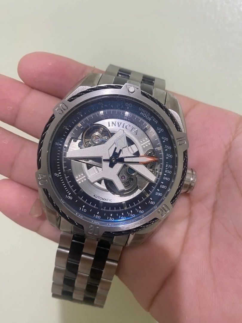 Invicta Aviator Automatic Mens Watch (Category: Men's Watches) located in Cavite. Submitted by Xteespreluhvd (Listing ID 1459962516, Image 1). Description: Invivta Aviator Automatic Mens Watch This is an Invicta Aviator Automatic men's watch. The dial is silver tone with an open heart design showing the Automatic movement. It has a stainless steel case, a bezel with cable accents and a black silicone band. It's water resistant to a depth of 100 m