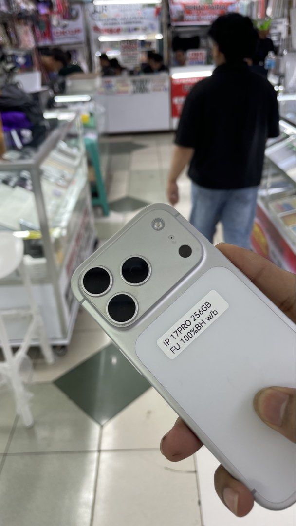 iPhone 17 Pro 256GB 100% BH NTC OPENLINE ORIG BOX (Category: iPhone 17 Series) located in Manila. Submitted by benshop. (Listing ID 1459905713, Image 2). Description: FOR SALE | TRADE/SWAP BenShop Price : 67,499 php ▫️On hand: iPhone 17 Pro ▫️256GB ▫️Openline/Factory unlocked ▫️SILVER ▫️100% Batt health ▫️NTC WITH ORIG BOX ▫️All Features Working INCLUSIONS & FREEBIES: *CHARGER SET *CLEAR CASE *TEMPERED GLASS MODE OF TRANSACTION: ▫️ STORE PICK UP 
