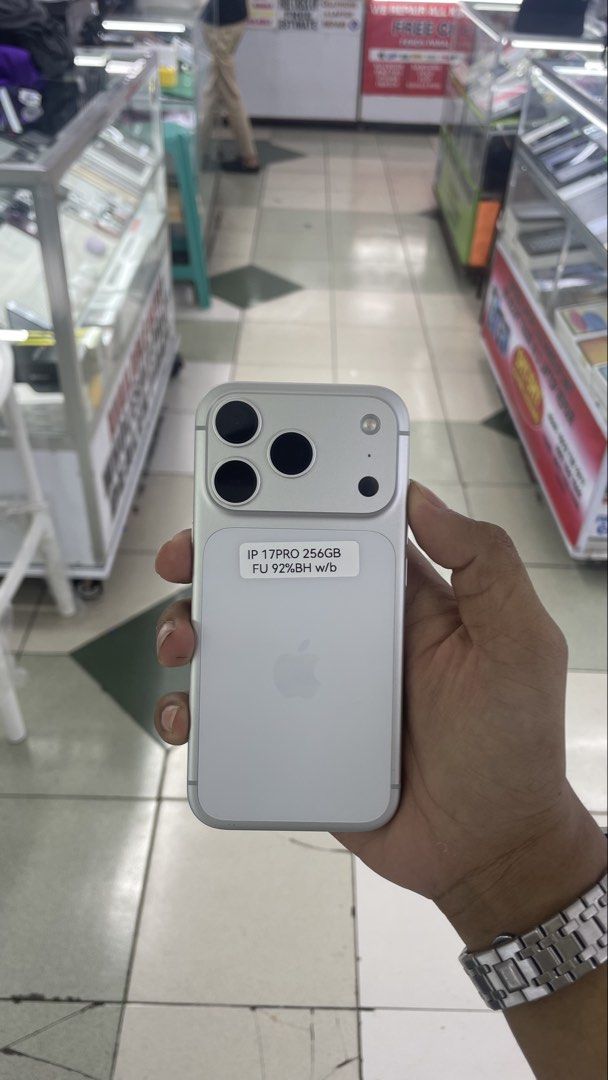 iPhone 17 Pro 256GB 92%BH NTC OPENLINE ORIG BOX (Category: iPhone 17 Series) located in Manila. Submitted by benshop. (Listing ID 1459905821, Image 1). Description: FOR SALE | TRADE/SWAP BenShop Price : 64,999 php ▫️On hand: iPhone 17 Pro ▫️256GB ▫️Openline/Factory unlocked ▫️SILVER ▫️92% Batt health ▫️NTC WITH ORIG BOX ▫️All Features Working INCLUSIONS & FREEBIES: *CHARGER SET *CLEAR CASE *TEMPERED GLASS MODE OF TRANSACTION: ▫️ STORE PICK UP (Pr