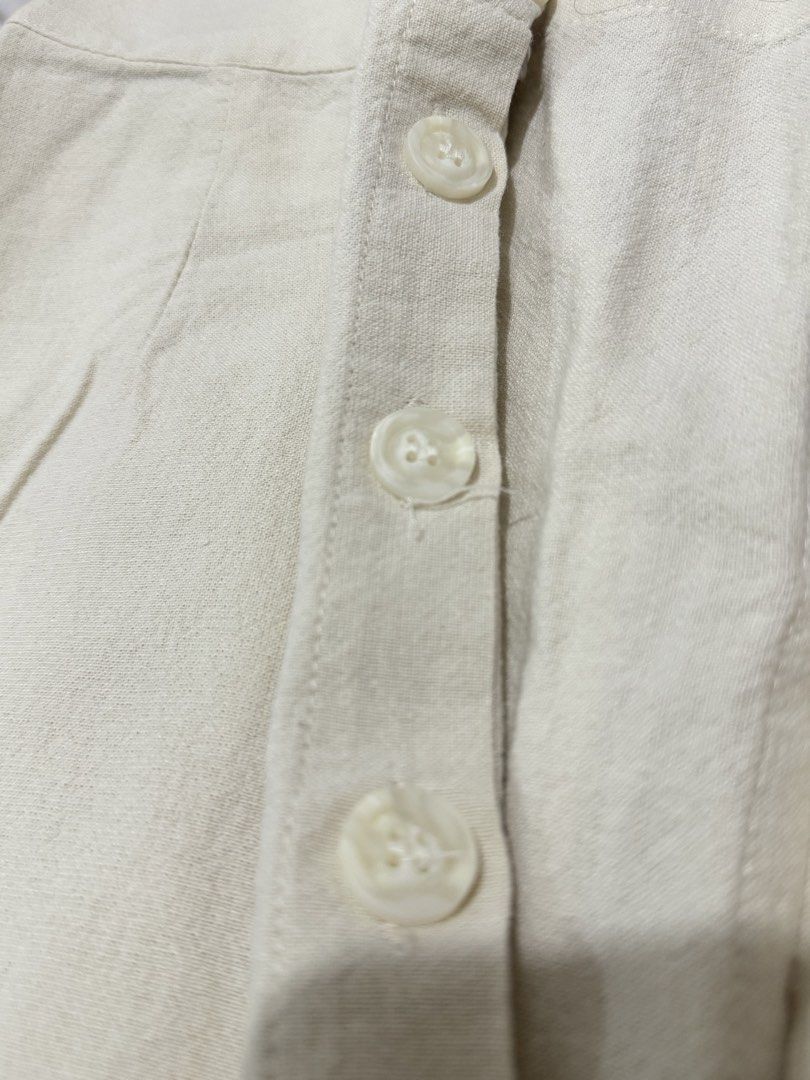 IVORY WHITE LINEN MIDI SKIRT (Category: Skirts) located in Quezon City. Submitted by reirei.08 (Listing ID 1459925967, Image 3). Description: - Quality: Loved and worn midi skirt. Complete working buttons and garterized back. - Linen fabric. Perfect for summer and beach outings. - RFS: Not my style anymore. SF is to be shouldered by buyer.