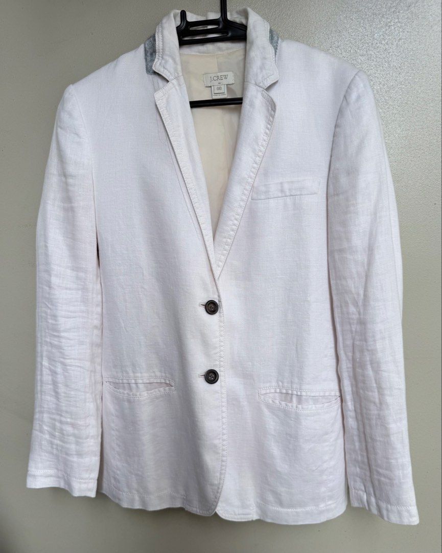 J. Crew Off-White Linen Blazer Size 00 (Category: Coats, Jackets and Outerwear) located in Pasig City. Submitted by lonelydove (Listing ID 1460034047, Image 1). Description: - White J. Crew blazer - 100% linen fabric - Polyester lining - Two-button front closure - Three buttons on each cuff - Ideal for layering or standalone wear - Perfect for warmer weather Actual measurements on item laying flat: Burst: 17.5 inch Shoulder: 14.5 inch Waist: 15.5