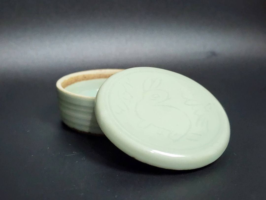 Japanese Celadon Kōgō — Rabbit Motif (Category: Other Home Decor) located in Quezon City. Submitted by lacasetta (Listing ID 1460030143, Image 3). Description: Elegant Japanese celadon kōgō (香合) featuring a finely incised rabbit design on the matching lid. Finished in a soft light celadon glaze with a natural unglazed base rim. Traditionally used for incense in Japanese tea ceremonies, it also works beautifully as a refined small trinket or jewel