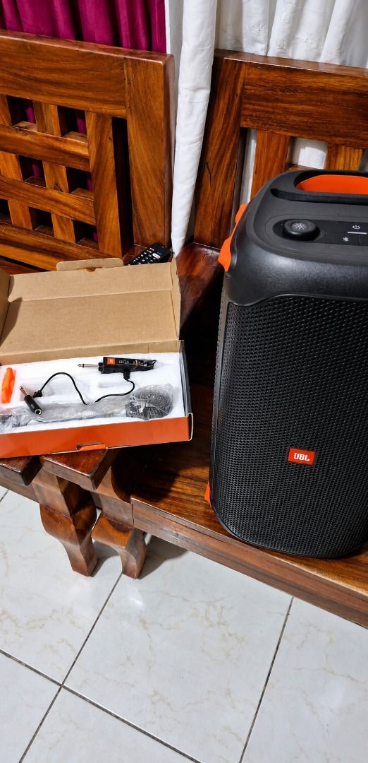 JBLPARTYBOX 110 WITH STAND (Category: Soundbars, Speakers & Amplifiers) located in Caloocan City. Submitted by jeaaaybeesebastian (Listing ID 1459939394, Image 3). Description: - JBL PartyBox 100 speaker - Includes two microphones and accessories - Ideal for parties and gatherings - Portable design with convenient handles - Bluetooth connectivity - Distinctive orange accents - Tested and confirmed working.