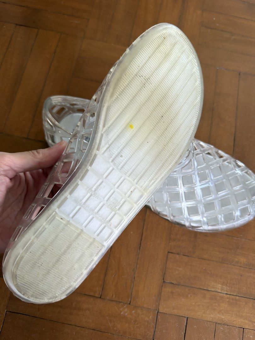 Jeffrey Campbell Clear Jelly Flats (Category: Flats & Sandals) located in Makati City. Submitted by curatedandnearlynew (Listing ID 1460023774, Image 3). Description: - Brand: Jeffrey Campbell - Style: Clear jelly flats - Design: Unique lattice pattern - Features: Easy slip-on, flexible material - Comfort: Comfortable for all-day wear - Occasion: Great for casual outings or beach days - Fun addition to any outfit.