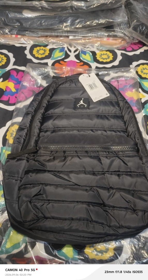 Jordan Air Puffer Backpack Black (Category: Backpacks) located in Manila. Submitted by swiftbird_ed6c34 (Listing ID 1459970549, Image 3). Description: - Jordan black puffer backpack - Features iconic Jumpman Air logo on the front - Main compartment for storage - Convenient front zip pocket - Adjustable shoulder straps for a comfortable fit - Side bottle pocket for hydration - Ideal for everyday use or travel.