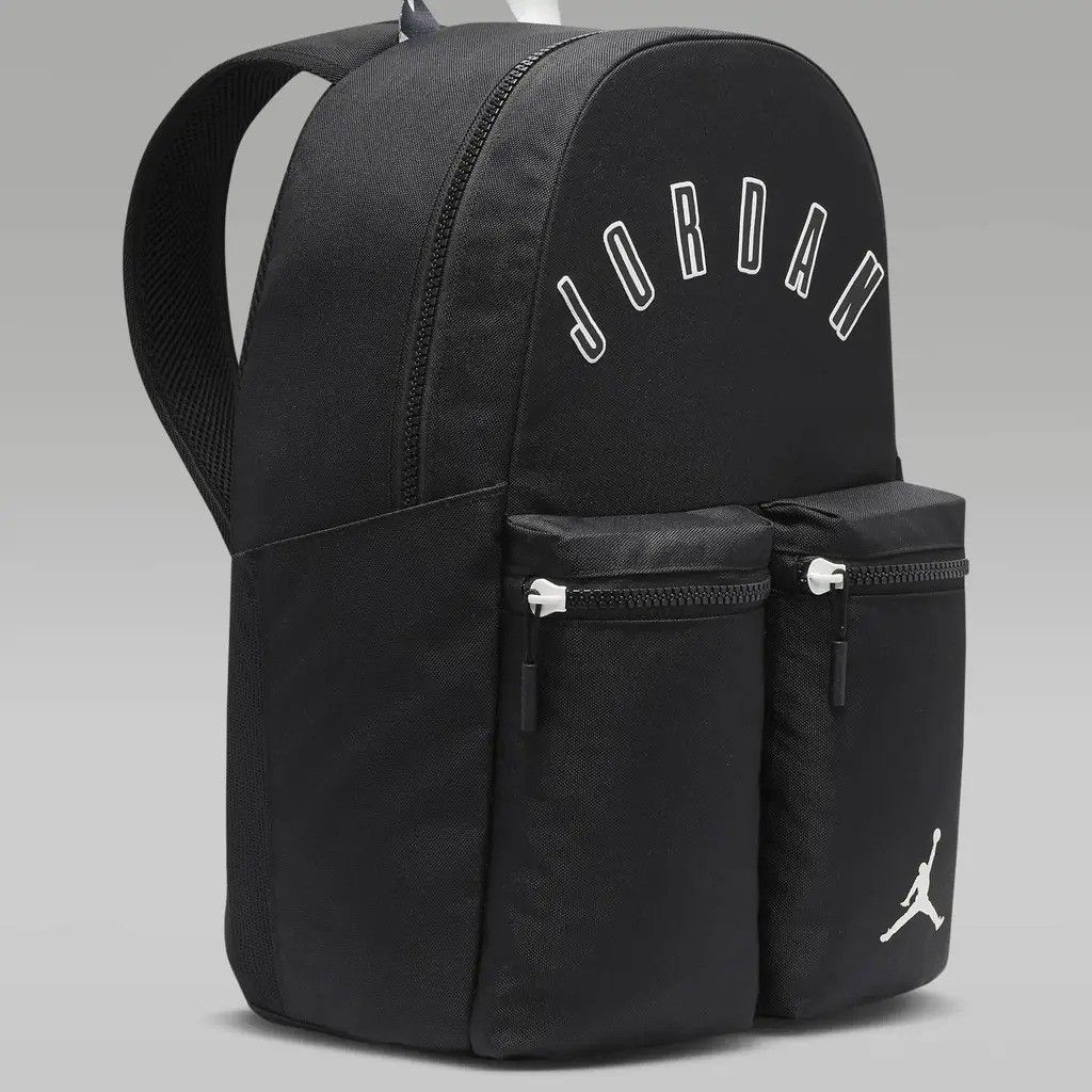 Jordan Jumpman Backpack Black (Category: Backpacks) located in Manila. Submitted by swiftbird_ed6c34 (Listing ID 1459968750, Image 3). Description: - Authentic Jordan backpack with iconic logo and text. - Two spacious front zip pockets for quick access. - Large main compartment for all your essentials. - Convenient side pockets for water bottles or umbrellas. - Comfortable padded shoulder straps for easy carrying. - Ideal for school, gym, or ever