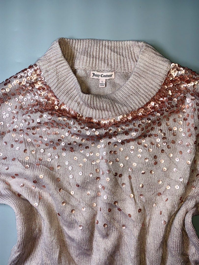 Juicy Couture Sequin Knit Sweater Size L (Category: Longsleeves) located in Dagupan City. Submitted by sj_styles0910. (Listing ID 1460095865, Image 2). Description: - Light beige Juicy Couture knit sweater - Sparkly rose gold sequins around neckline and scattered throughout - Long sleeves with ribbed cuffs - Cozy and stylish design - Versatile for dressing up or down.