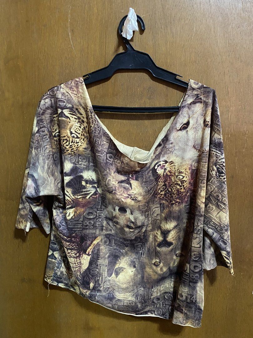 Jungle Batwing Off Shoulder Top (Category: Others Tops) located in Pasig City. Submitted by rzziee (Listing ID 1459948570, Image 2). Description: Width: 19 in Length: 20 in M-L DM for when worn pics and more deets! *Color may vary due to lighting..