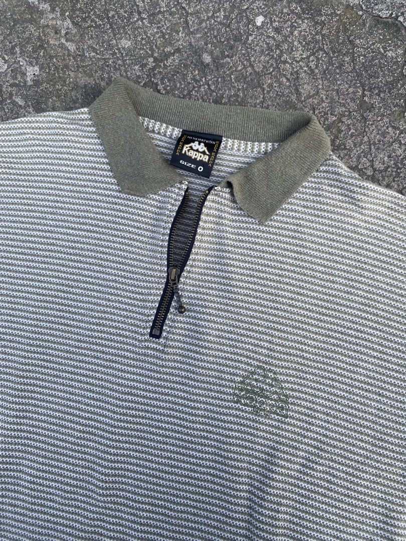“KAPPA” RARE QUATER ZIP (Category: Coats, Jackets and Outerwear) located in Muntinlupa City. Submitted by denrik (Listing ID 1459901175, Image 3). Description: VINTAGE 90s KAPPA “For The Spirit Within” Striped Polo 🔥 Rare Y2K piece. Quarter-zip, striped pique knit with tonal embroidered logo. Details: - Era: Late 90s - Early 2000s - Tag: Kappa “For the spirit within” + SIZE O [Oversize] - Made in: Italy/Portugal - Color: Gray/White stripes, Oliv