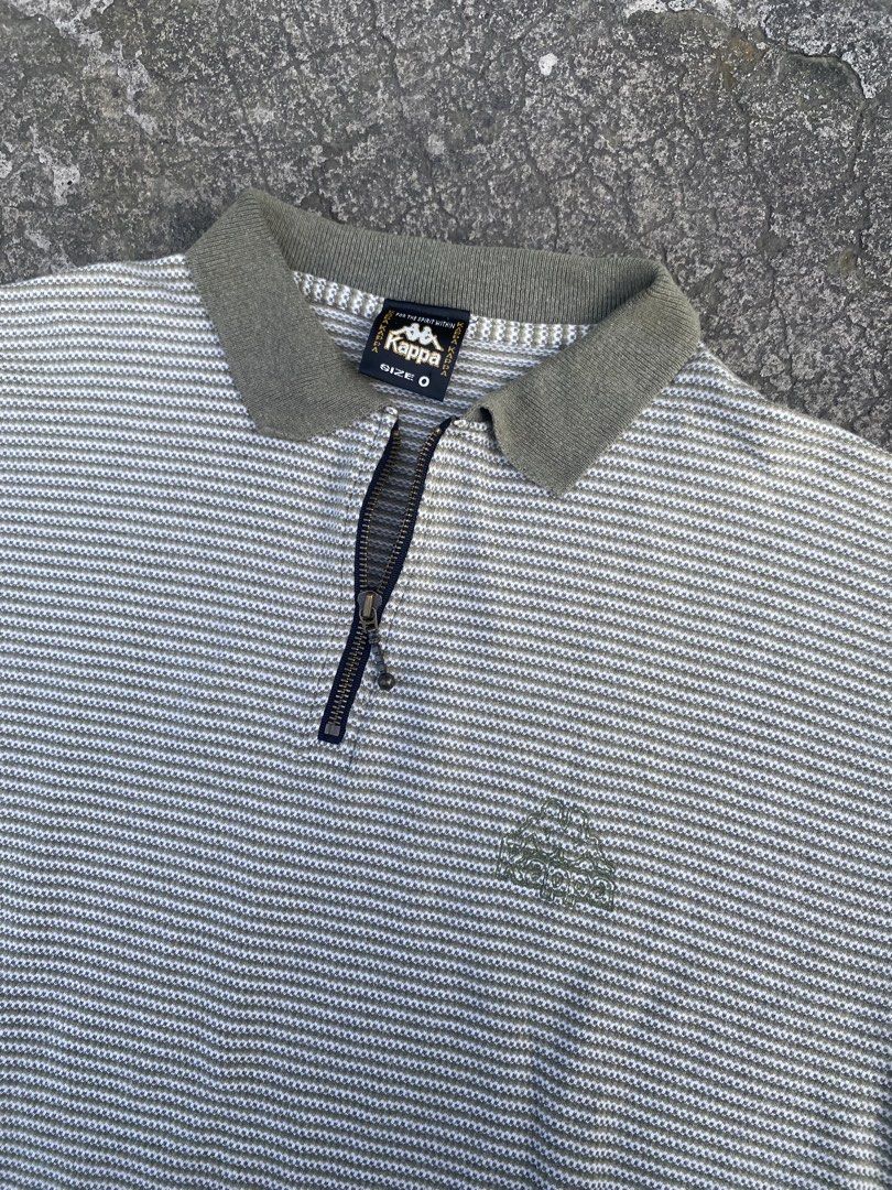 “KAPPA” RARE QUATER ZIP (Category: Coats, Jackets and Outerwear) located in Muntinlupa City. Submitted by denrik (Listing ID 1459901175, Image 2). Description: VINTAGE 90s KAPPA “For The Spirit Within” Striped Polo 🔥 Rare Y2K piece. Quarter-zip, striped pique knit with tonal embroidered logo. Details: - Era: Late 90s - Early 2000s - Tag: Kappa “For the spirit within” + SIZE O [Oversize] - Made in: Italy/Portugal - Color: Gray/White stripes, Oliv