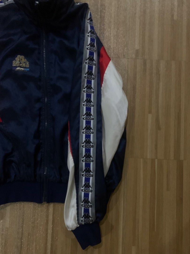 Kappa Track Jacket Navy Blue White Red Small (Category: Coats, Jackets and Outerwear) located in Dagupan City. Submitted by prelovedthatshi (Listing ID 1459900607, Image 2). Description: - Vintage Kappa track jacket - Navy blue with red and white panel details - Iconic Kappa logo tape on sleeves and collar - Comfortable mesh lining - Size: Small.
