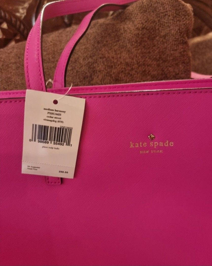 Kate Spade Medium Tote Bag - Pink (Category: Tote Bags) located in Valenzuela. Submitted by bella_onez (Listing ID 1460029812, Image 2). Description: - Bright pink Kate Spade tote bag - Medium size, ideal for daily use - Interior lined with playful polka dots - Brand new with original tags attached - Spacious interior for all your essentials.