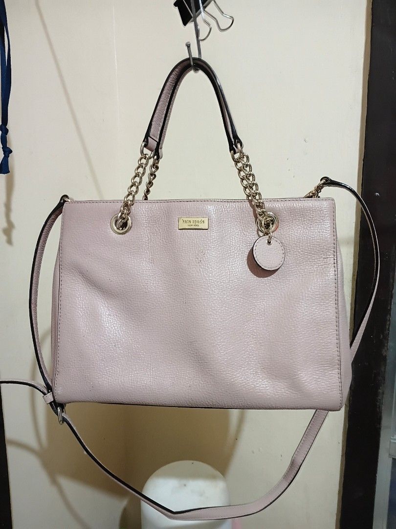 Kate Spade Pink Leather Shoulder Bag with Chain Strap (Category: Luxury Bags & Wallets) located in Cavite. Submitted by ms.de.clutter (Listing ID 1460031200, Image 1). Description: -Authentic preloved KS purchased from the US -Genuine pink leather Kate Spade shoulder bag - Textured finish for added style - Elegant chain strap - Signature spade charm detail - Multiple interior compartments for organization - Interior zip pocket for secure storage 