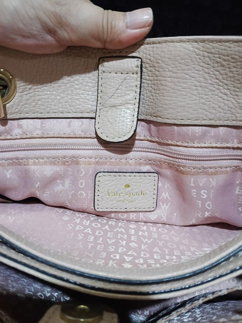 Kate Spade Pink Leather Shoulder Bag with Chain Strap (Category: Luxury Bags & Wallets) located in Cavite. Submitted by ms.de.clutter (Listing ID 1460031200, Image 3). Description: -Authentic preloved KS purchased from the US -Genuine pink leather Kate Spade shoulder bag - Textured finish for added style - Elegant chain strap - Signature spade charm detail - Multiple interior compartments for organization - Interior zip pocket for secure storage 