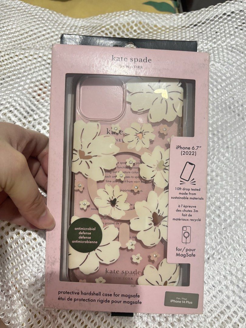 Katespade Iphone 14 Plus Case (Category: Cases & Sleeves) located in Quezon City. Submitted by ccloset_ (Listing ID 1459909449, Image 1). Description: - Brand: Kate Spade New York - Model: iPhone 14 Plus (iPhone 6.7" 2022) - Design: Beautiful floral pattern with subtle sparkle - Features: Protective hardshell, MagSafe compatible, Antimicrobial defense - Material: Made from sustainable materials - Can fit Iphone 15 Plus.