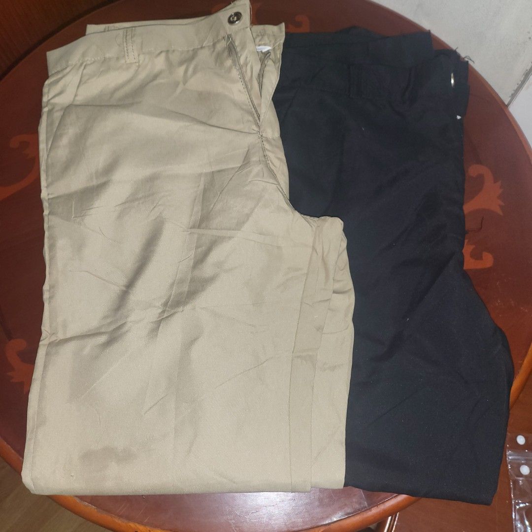Khaki and Black Pants Size 34 (Category: Trousers) located in Mandaluyong City. Submitted by theosystem (Listing ID 1459960025, Image 1). Description: - Two pairs of pants included: 1 Khaki, 1 Black - Size: 34 for both pairs - Ideal for everyday wear - Feel free to ask any questions!.